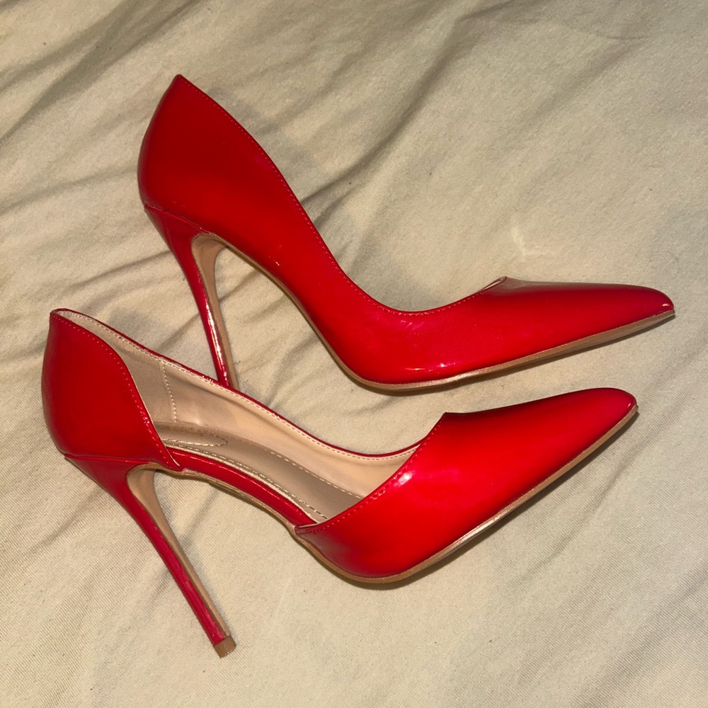 Worn Once. Red Stiletto Heels. snug fit. probably best for a size 7.5